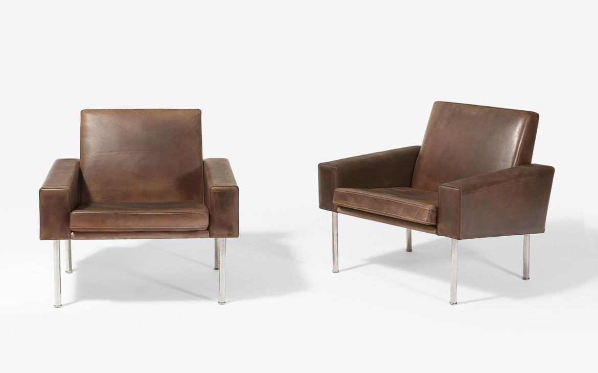 A pair of leather club chairs produced by AP Stolen of Denmark in 1959. Photo: auction.fr.