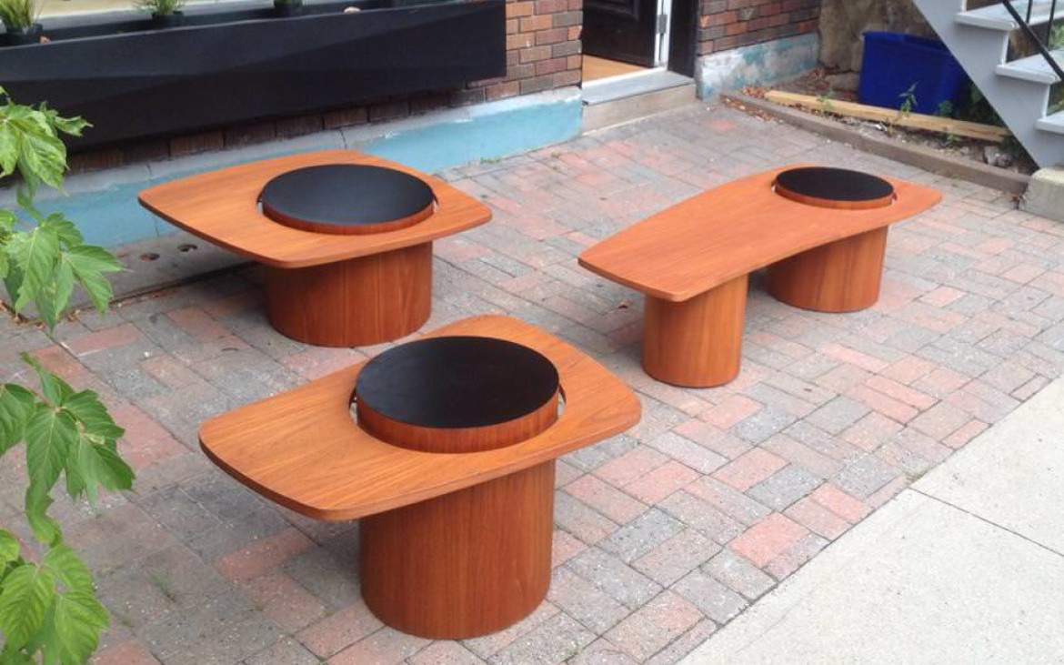 Common side in Montreal with a set of teak 'Martini' coffee and end tables lounging on the sidewalk outside a dealer. Photo: facebook.com/DuDesignDuRetroetduKitch
